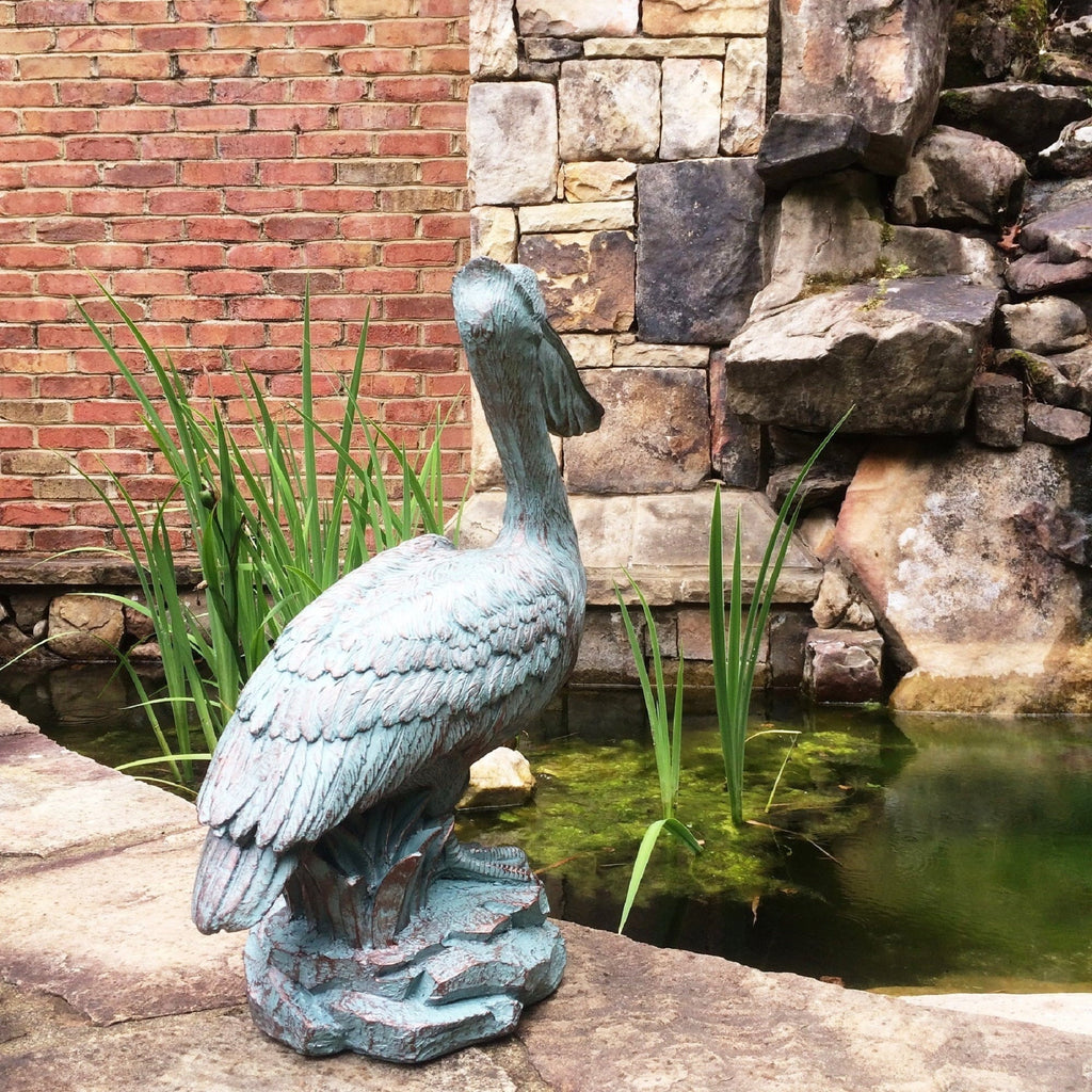 Homestyles 20 in. Bronze Patina Pelican on Coastal Rock Nautical Beach Sizetatue