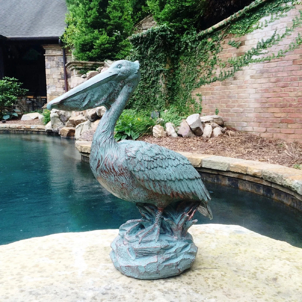 Homestyles 20 in. Bronze Patina Pelican on Coastal Rock Nautical Beach Sizetatue